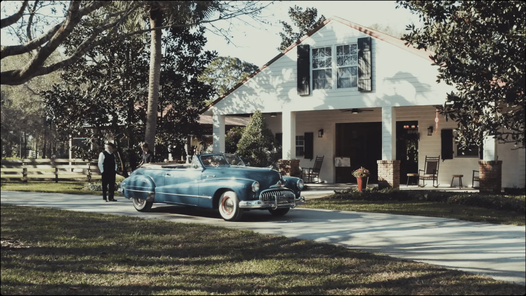 Vintage blue car outside Magnolia Manor wedding venue in Vero Beach